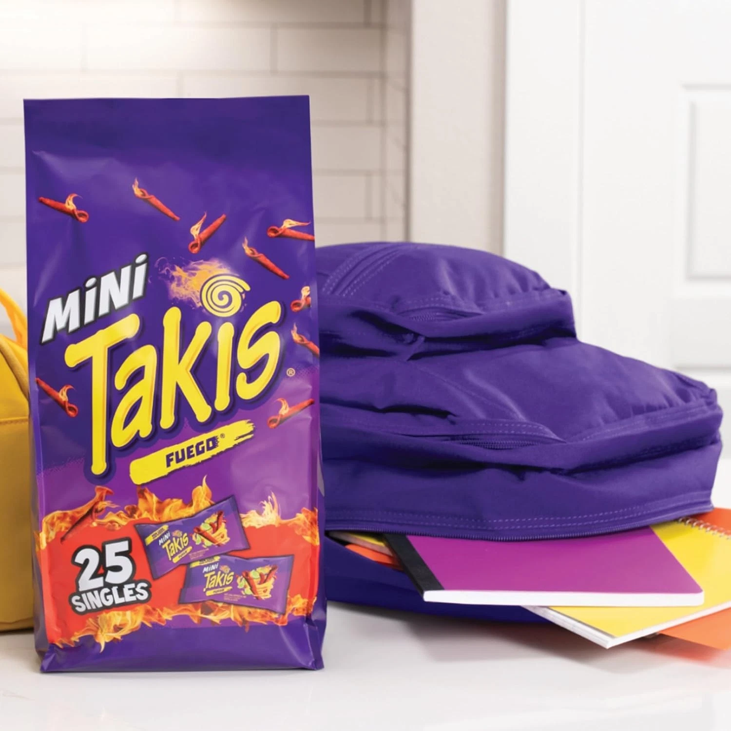 Mini Takis Fuego 25 Singles Get ready to dive into the bold and flavorful world of Takis snacks! These rolled corn tortilla chips are known for their unique shape, irresistible crunch, and explosive flavor that will leave your taste buds craving more Perfect for those who love intense, spicy snacks, Takis delivers a satisfying bite every time. Fuego: Zesty and intensely hot chili pepper and lime flavored chips, for those who dare; Heat-O-Meter: Extreme These bite-sized pouches are perfect for taking with you wherever you go. Whether it’s a tailgate, birthday party, celebration, or just a quick snack at the office or school, they’re super convenient to have on hand. Plus, they’re great for stocking your home pantry! Made in Mexico Imported from the UK Mini Takis Fuego 25 Singles - Image 1